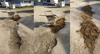 Sokakları yapılmayınca Turgutlu'da bazı vatandaşlar kazma kürek işe koyuldu!